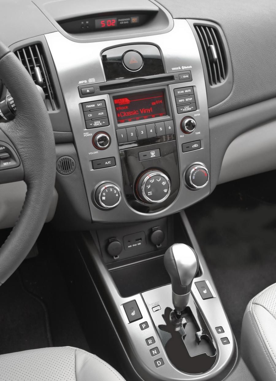  Kia Forte 2009 года  (фото 64 из 128)
